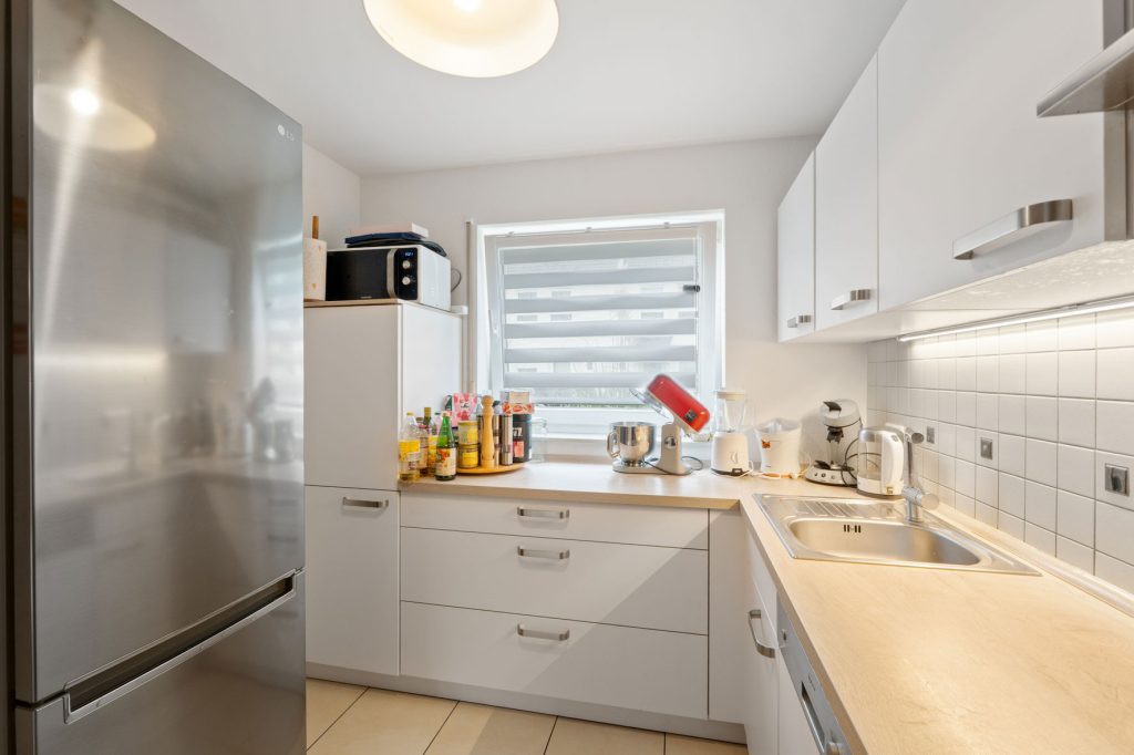 Gütelhöfer Immobilien - Immobilienangebot - Bonn / Tannenbusch - Alle - Junges Reihenmittelhaus mit Garten, Einbauküche und Kfz-Stellplatz in begehrter Lage von Tannenbusch
