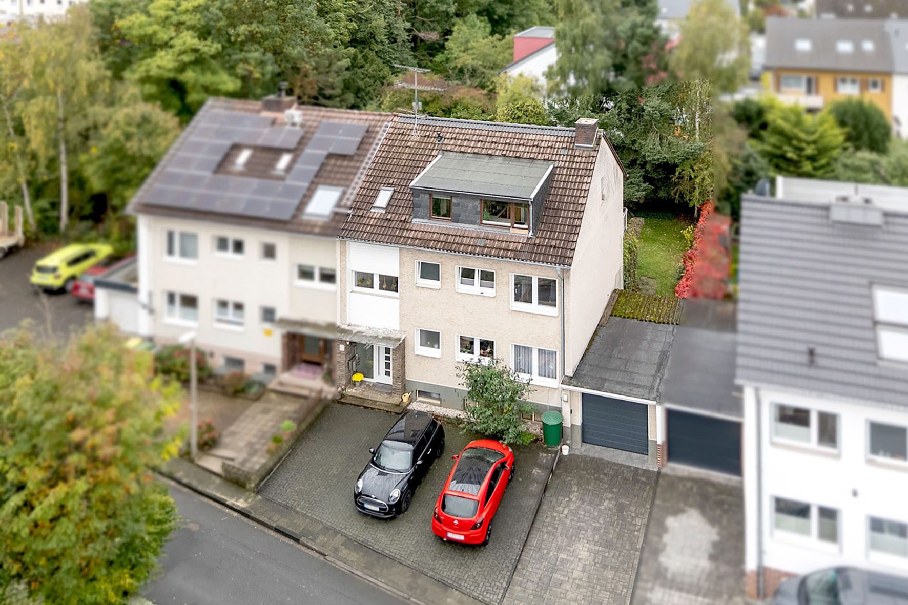 Titelbild Gütelhöfer Immobilien - Immobilienangebot - Rheinbach - Alle - Solides und voll vermietetes Dreifamilienhaus mit Garten, Balkon und Garage in Rheinbacher Citylage