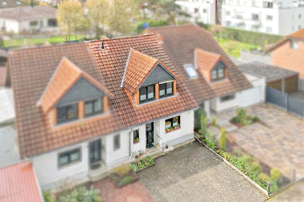 Gütelhöfer Immobilien - Immobilienangebot - Rheinbach - Alle - Solide vermietetes Reihenmittelhaus mit Garten, Terrasse und zwei Stellplätzen in Rheinbach / Stadt