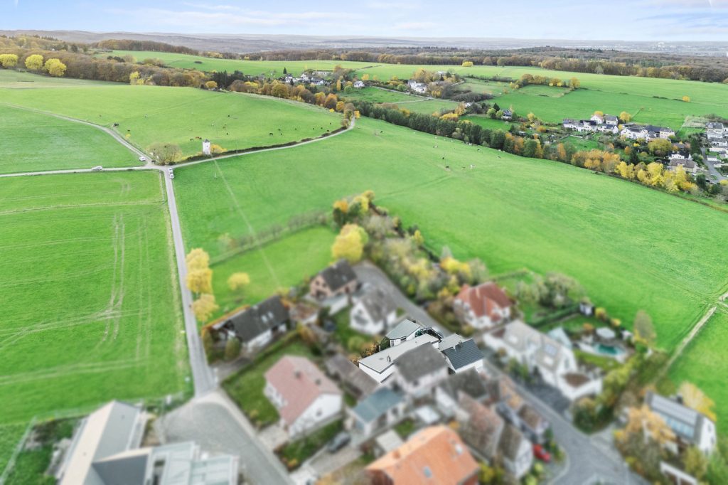 Gütelhöfer Immobilien - Immobilienangebot - Rheinbach / Merzbach - Alle - Zwei auf einen Streich! Zwei modernisierte Einfamilienhäuser mit Garten und Garage in Merzbach