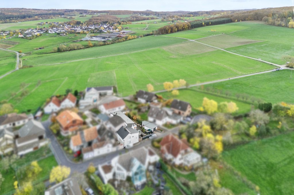 Gütelhöfer Immobilien - Immobilienangebot - Rheinbach / Merzbach - Alle - Zwei auf einen Streich! Zwei modernisierte Einfamilienhäuser mit Garten und Garage in Merzbach