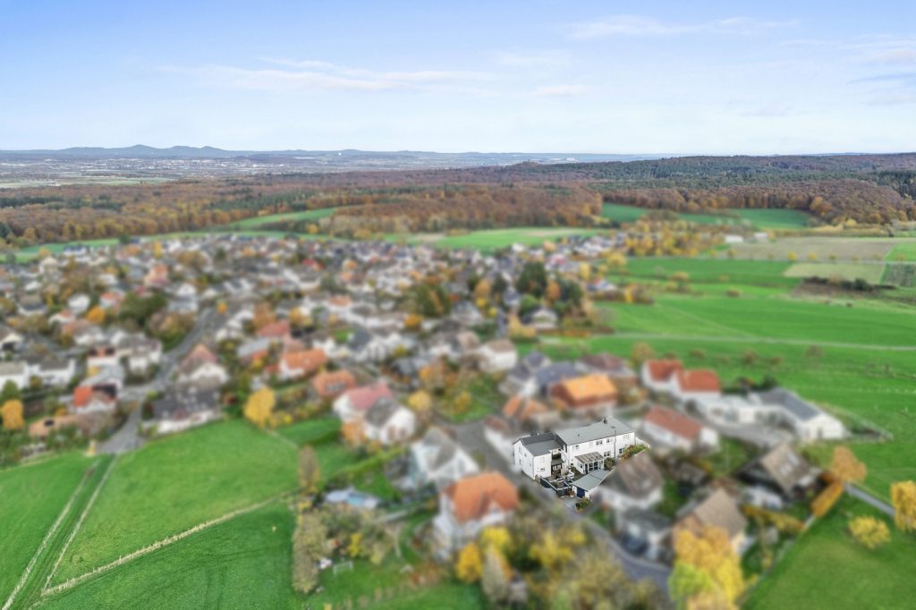 Gütelhöfer Immobilien - Immobilienangebot - Rheinbach / Merzbach - Alle - Zwei auf einen Streich! Zwei modernisierte Einfamilienhäuser mit Garten und Garage in Merzbach