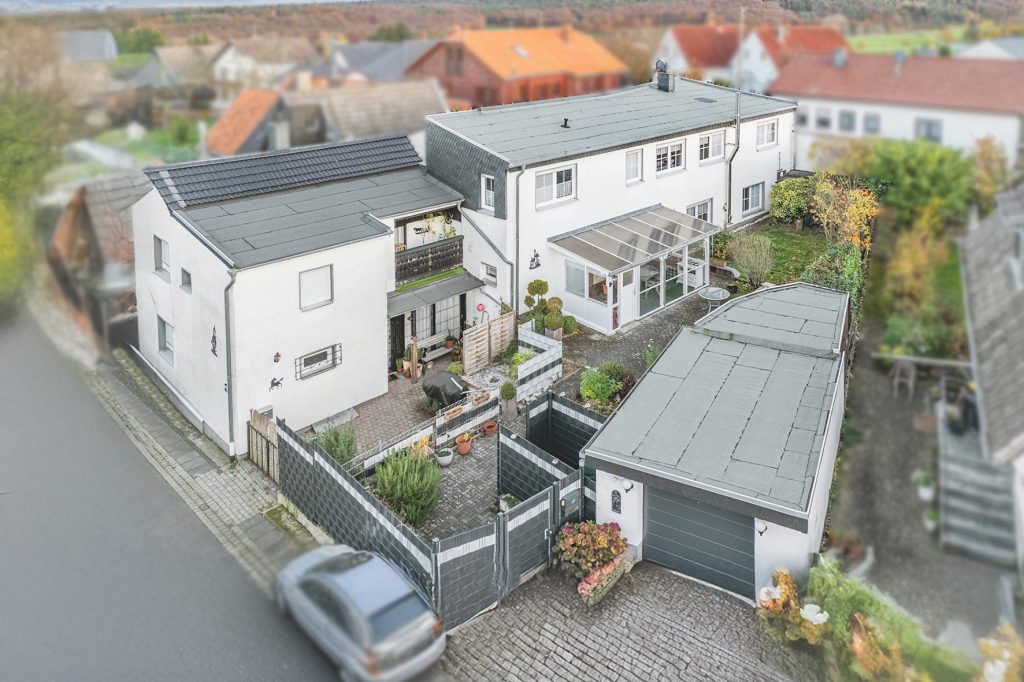Gütelhöfer Immobilien - Immobilienangebot - Rheinbach / Merzbach - Alle - Zwei auf einen Streich! Zwei modernisierte Einfamilienhäuser mit Garten und Garage in Merzbach