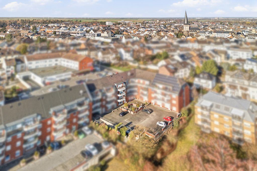 Gütelhöfer Immobilien - Immobilienangebot - Euskirchen - Alle - Solide vermietetes Ladenlokal für Kapitalanleger am Rand der Euskirchener Kernstadt mit Stellplatz