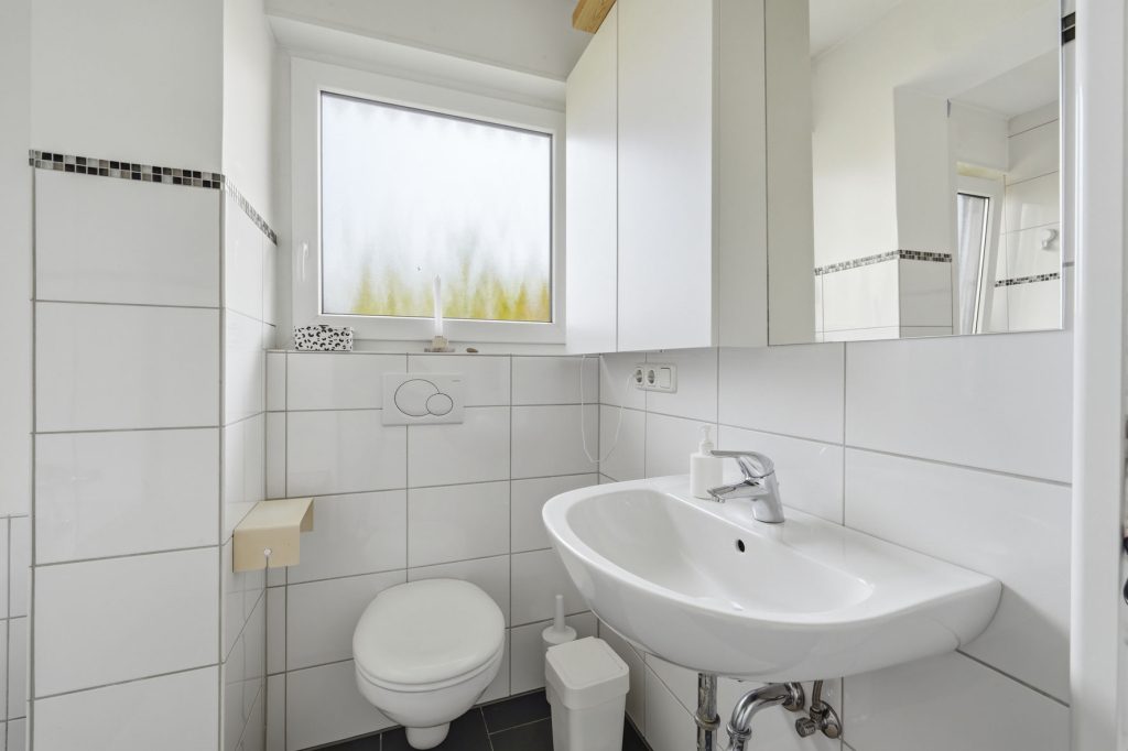 Gütelhöfer Immobilien - Immobilienangebot - Rheinbach / Merzbach - Alle - Modernisiert u. stilvoll! Solide vermietete Doppelhaushälfte mit Garten in ruhiger Lage von Merzbach