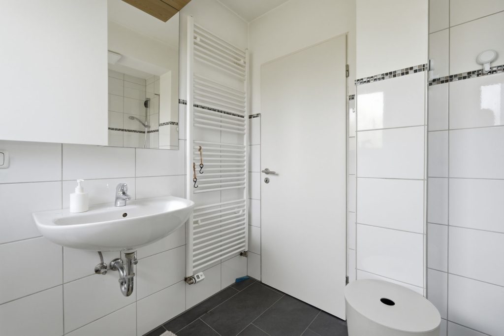 Gütelhöfer Immobilien - Immobilienangebot - Rheinbach / Merzbach - Alle - Modernisiert u. stilvoll! Solide vermietete Doppelhaushälfte mit Garten in ruhiger Lage von Merzbach