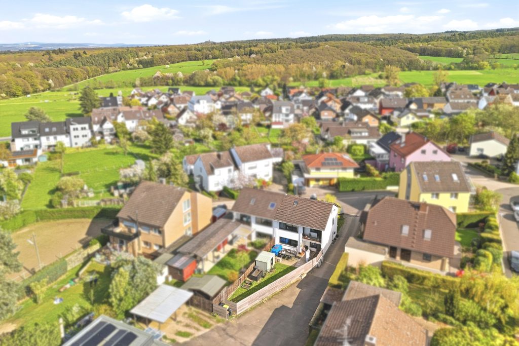 Gütelhöfer Immobilien - Immobilienangebot - Rheinbach / Merzbach - Alle - Modernisiert u. stilvoll! Solide vermietete Doppelhaushälfte mit Garten in ruhiger Lage von Merzbach