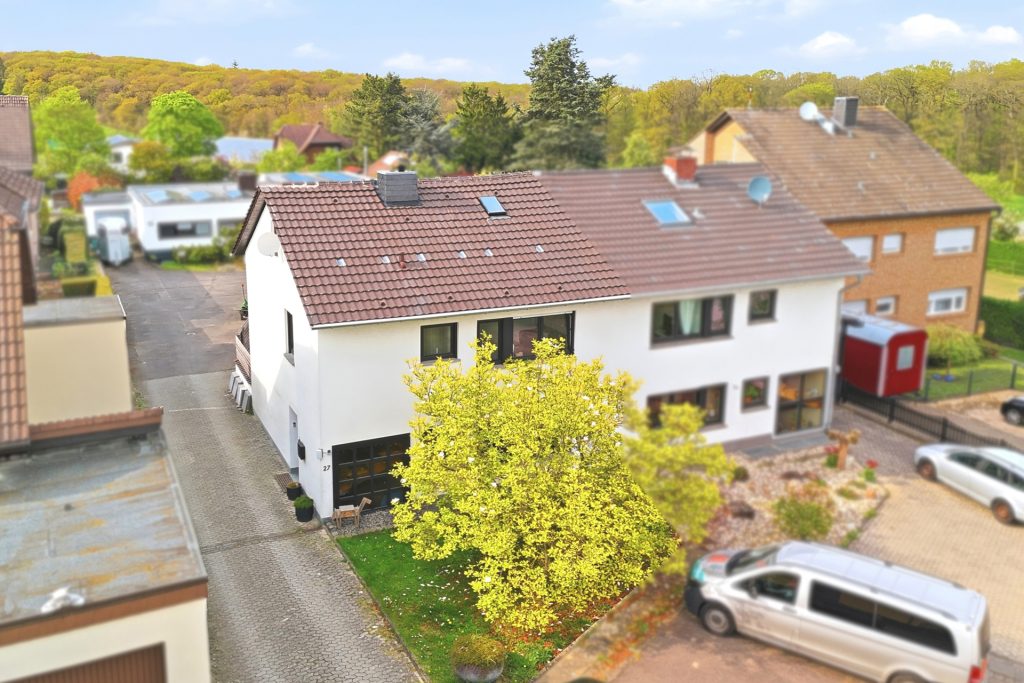 Gütelhöfer Immobilien - Immobilienangebot - Rheinbach / Merzbach - Alle - Modernisiert u. stilvoll! Solide vermietete Doppelhaushälfte mit Garten in ruhiger Lage von Merzbach