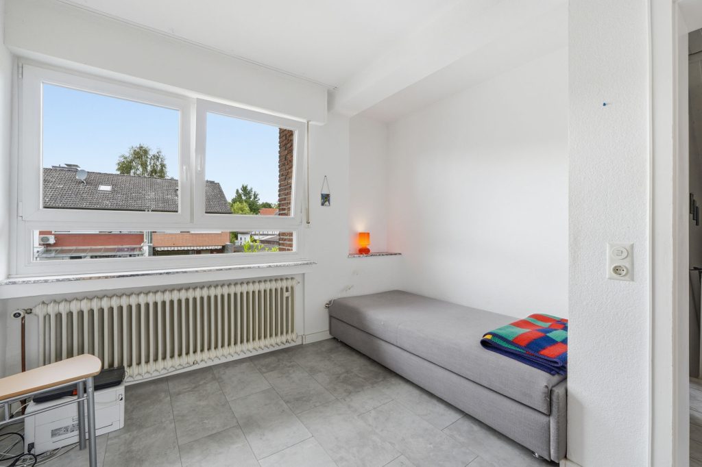 Gütelhöfer Immobilien - Immobilienangebot - Wesseling / Keldenich - Alle - Solides Reihenendhaus mit Garage, Garten und überdachter Terrasse in beliebter Lage von Keldenich