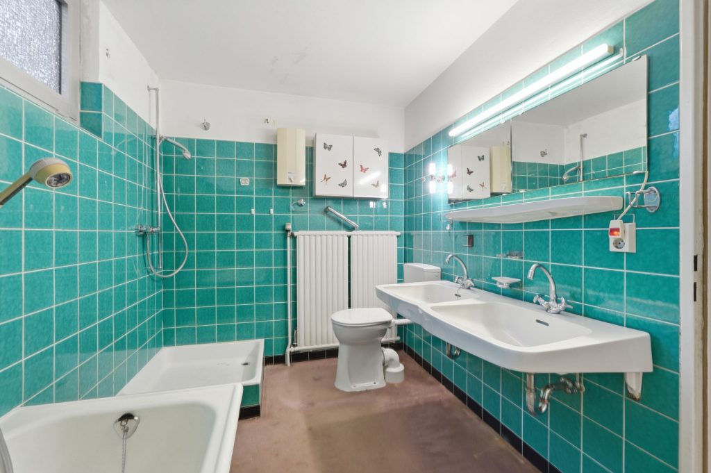 Gütelhöfer Immobilien - Immobilienangebot - Wachtberg / Niederbachem - Alle - Großzügiges Splitlevel-Reihenendhaus mit Garage, Garten und viel Potenzial in begehrter Wohnlage