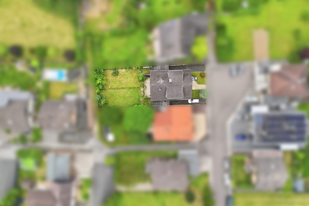 Gütelhöfer Immobilien - Immobilienangebot - Euskirchen / Flamersheim - Alle - Vermietetes Zweifamilienhaus mit Entwicklungspotenzial, 2 Garagen und großem Garten in Flamersheim
