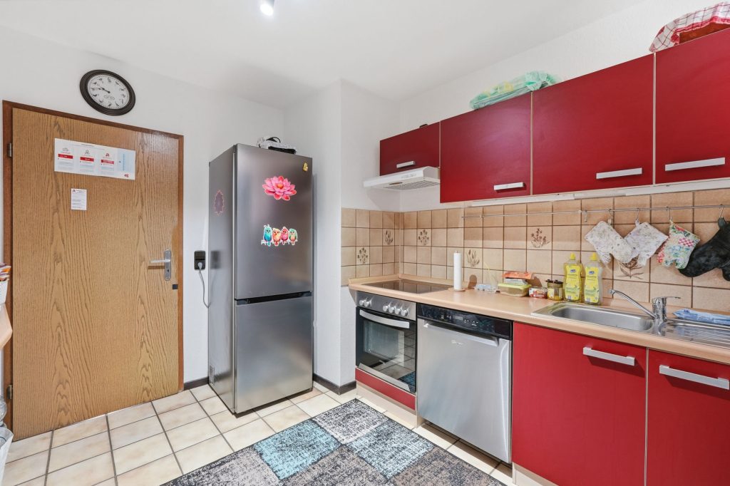 Gütelhöfer Immobilien - Immobilienangebot - Euskirchen / Flamersheim - Alle - Vermietetes Zweifamilienhaus mit Entwicklungspotenzial, 2 Garagen und großem Garten in Flamersheim