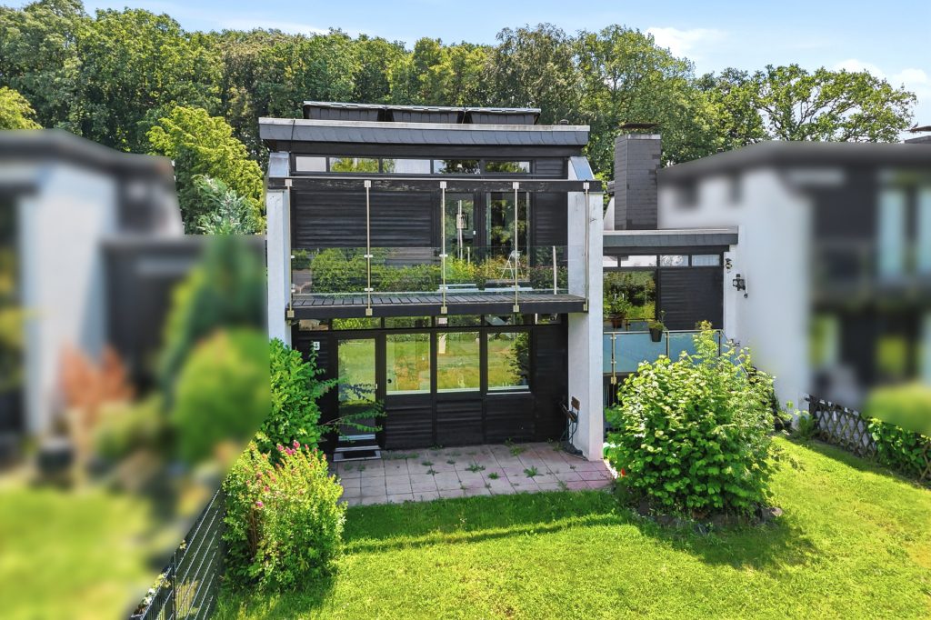 Gütelhöfer Immobilien - Immobilienangebot - Meckenheim - Alle - Lichtdurchfluteter Split-Level-Wohntraum mit PV Anlage, zwei Terrassen, offenem Kamin und Garage