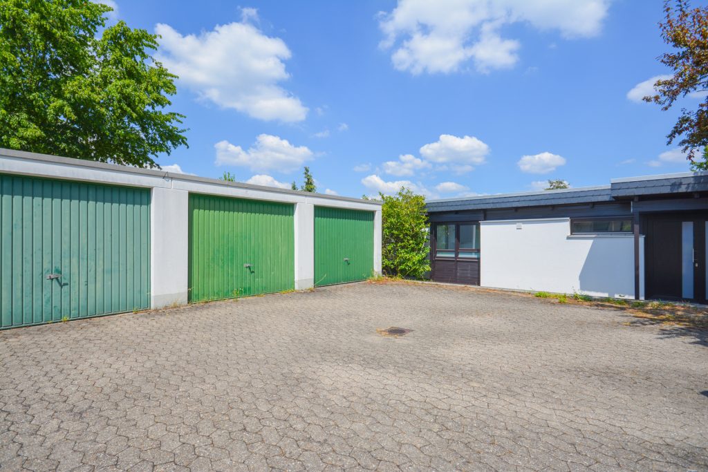 Gütelhöfer Immobilien - Immobilienangebot - Meckenheim - Alle - Lichtdurchfluteter Split-Level-Wohntraum mit PV Anlage, zwei Terrassen, offenem Kamin und Garage