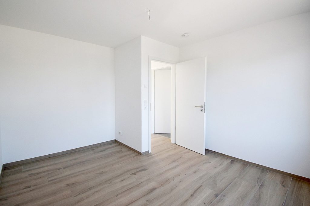 Gütelhöfer Immobilien - Immobilienangebot - Swisttal / Straßfeld - Alle - Neuwertig! Energieeffiziente 143m² Doppelhaushälfte mit Garten, Einbauküche und Garage in Straßfeld