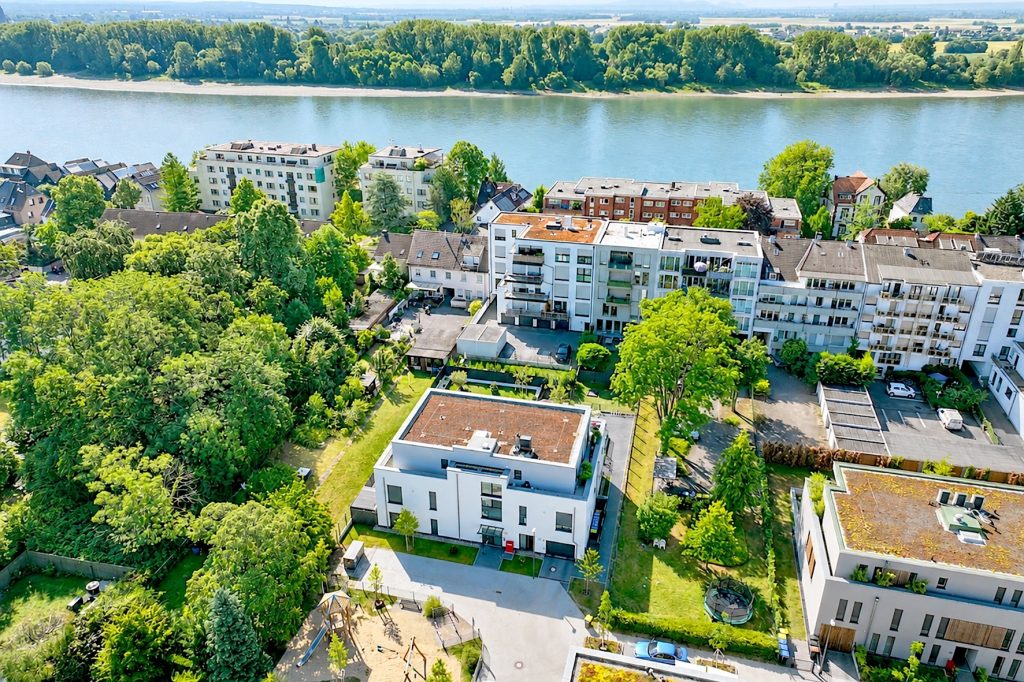 Gütelhöfer Immobilien - Immobilienangebot - Köln / Sürth - Alle - Erstbezug! Exklusive 3-Zimmer-Wohnung mit Dachterrasse und TG-Stellplatz in Rheinnähe von Köln-Sürth