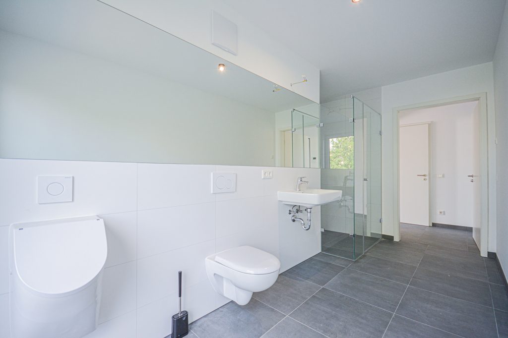 Gütelhöfer Immobilien - Immobilienangebot - Köln / Sürth - Alle - Erstbezug! Exklusive 3-Zimmer-Wohnung mit Dachterrasse und TG-Stellplatz in Rheinnähe von Köln-Sürth