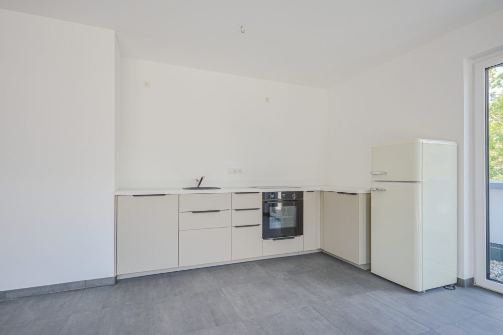 Gütelhöfer Immobilien - Immobilienangebot - Köln / Sürth - Alle - Erstbezug! Exklusive 3-Zimmer-Wohnung mit Dachterrasse und TG-Stellplatz in Rheinnähe von Köln-Sürth